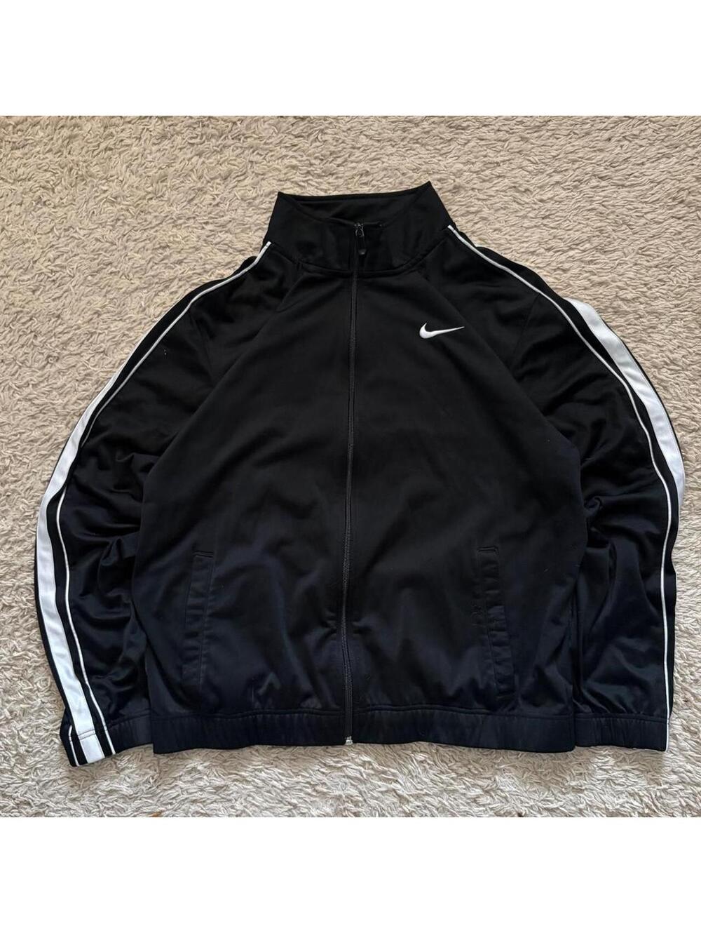 Nike black track jacket with white stripes on sleeves